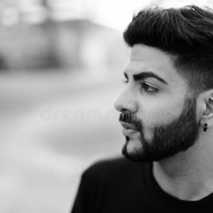 portrait-young-handsome-indian-man-beard-outdoors-shot-black-white-close-up-profile-view-thinking-park-159612598